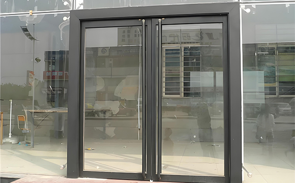 达日玻璃地弹门