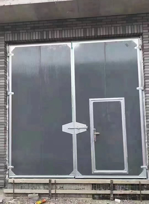 达日工业平开门在大型设备制造车间的应用实例